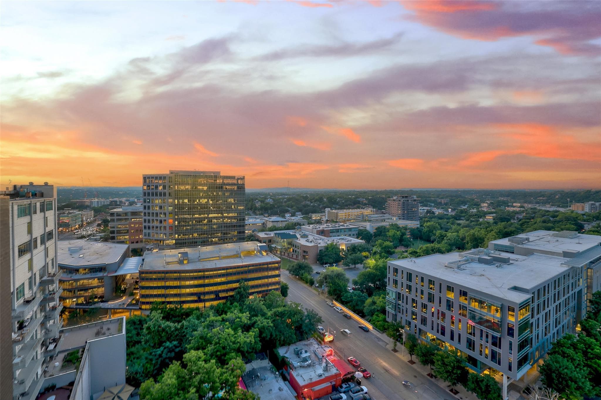 Witness vibrant sunsets over a dynamic cityscape,