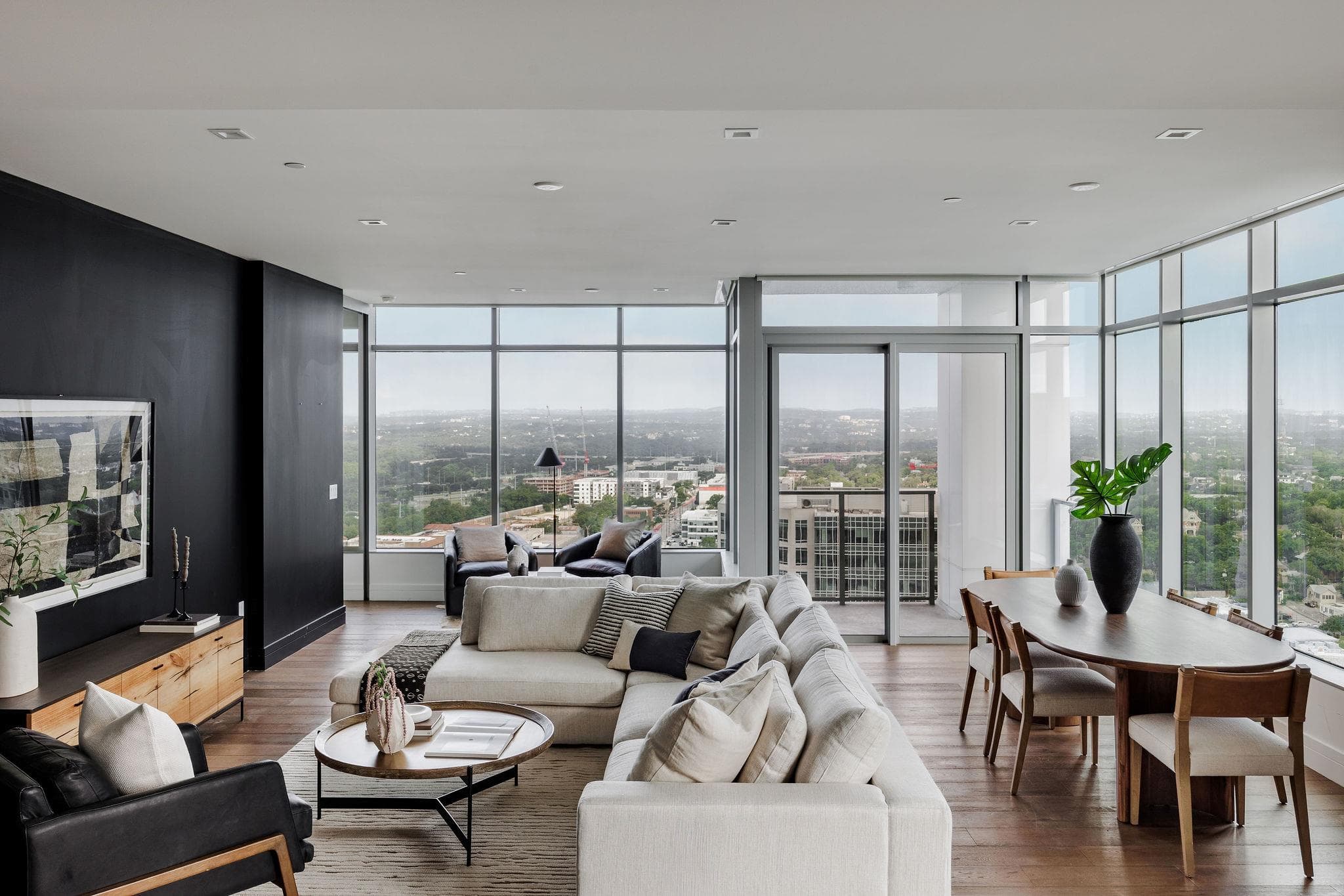 Floor-to-ceiling windows showcase captivating cit