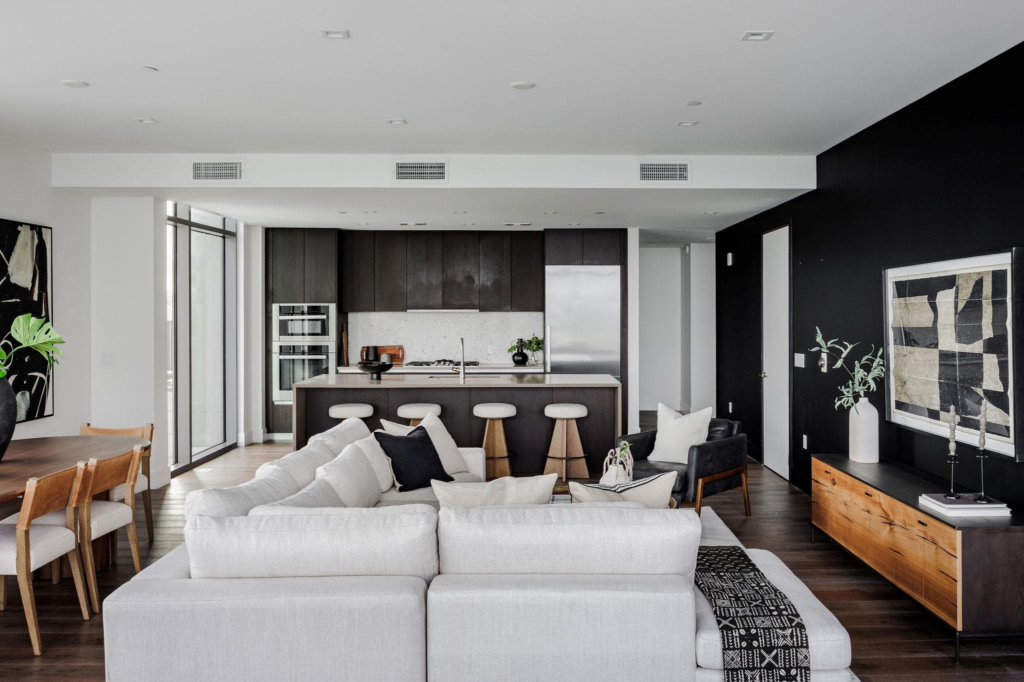 An open concept living area seamlessly connects t