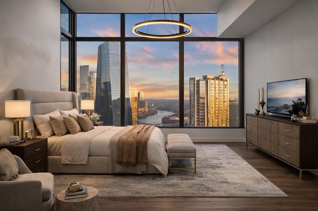 Floor-to-ceiling skyline and river views from a Fifth & West residence